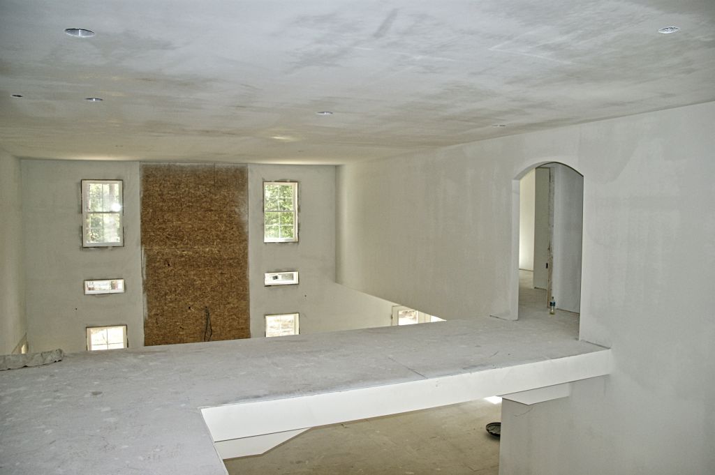 view from bonus room looking at fireplace wall